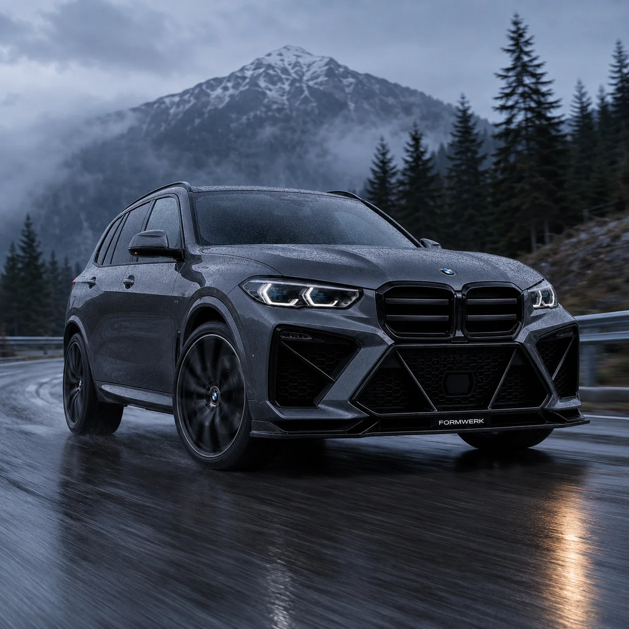 a green X5 with the Bulldog front, head-on on a coast road.
